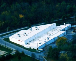 aerial view of white roof of a commercial building