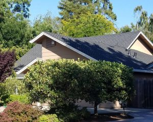 yellow house with new roof