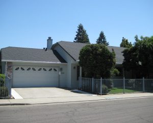 roof on white home