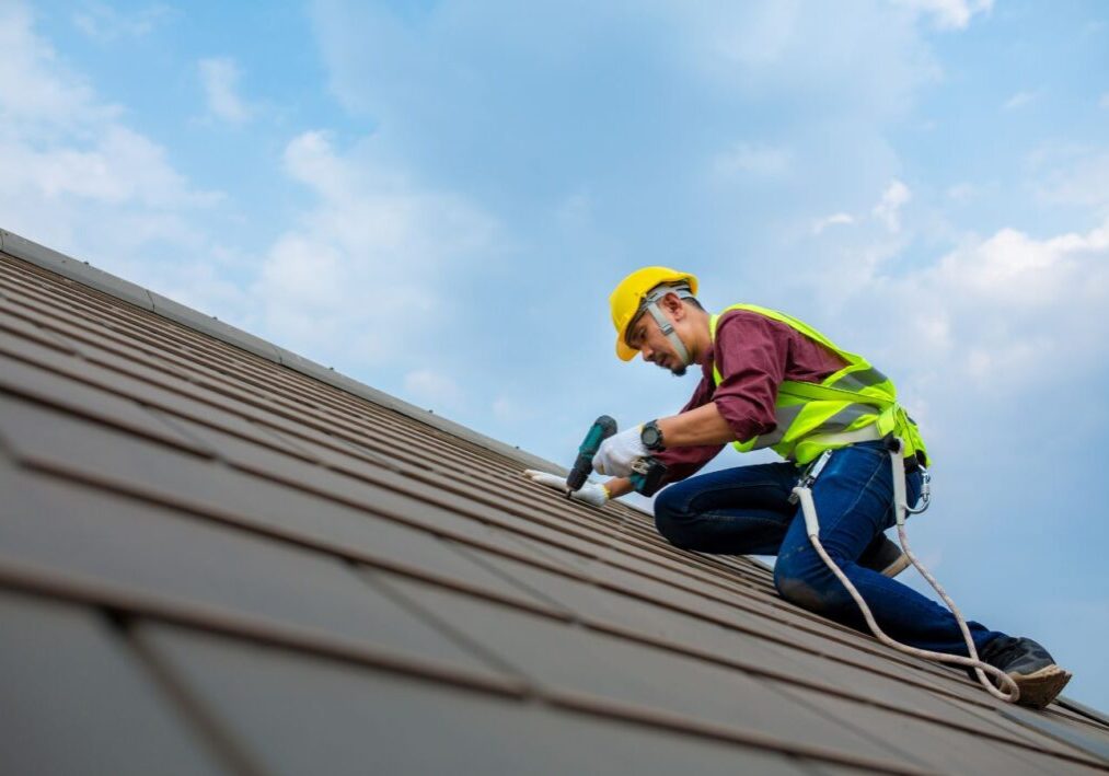 professional roofer working on commercial roofing stockton